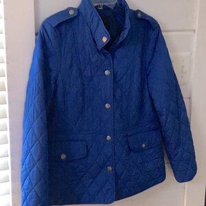 A tad small on me great lightweight quilted puffer jacket.royal blue